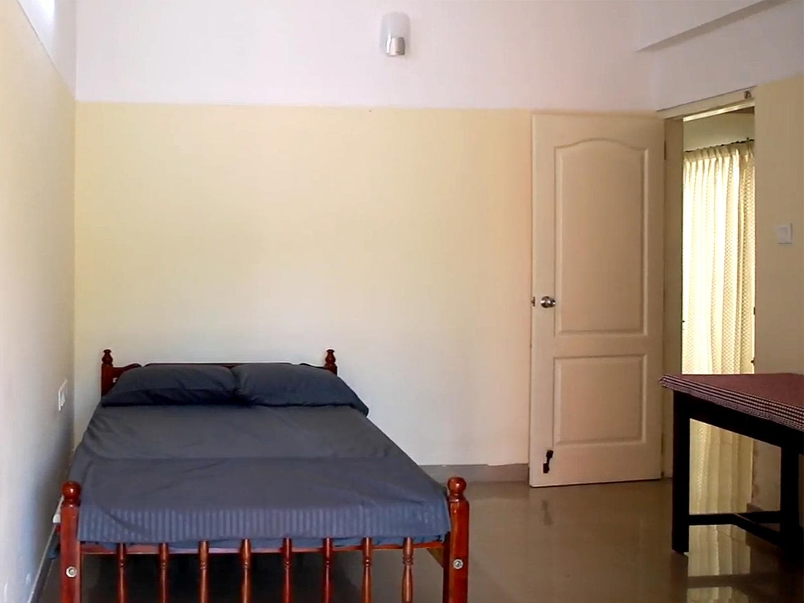 Apartment bedroom with balcony access